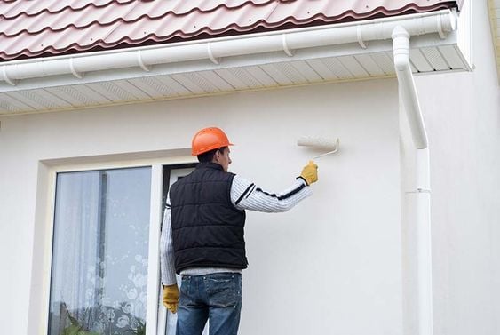 Comment enduire un mur en parpaing au rouleau monocouche ? - La Maison  Parfaite